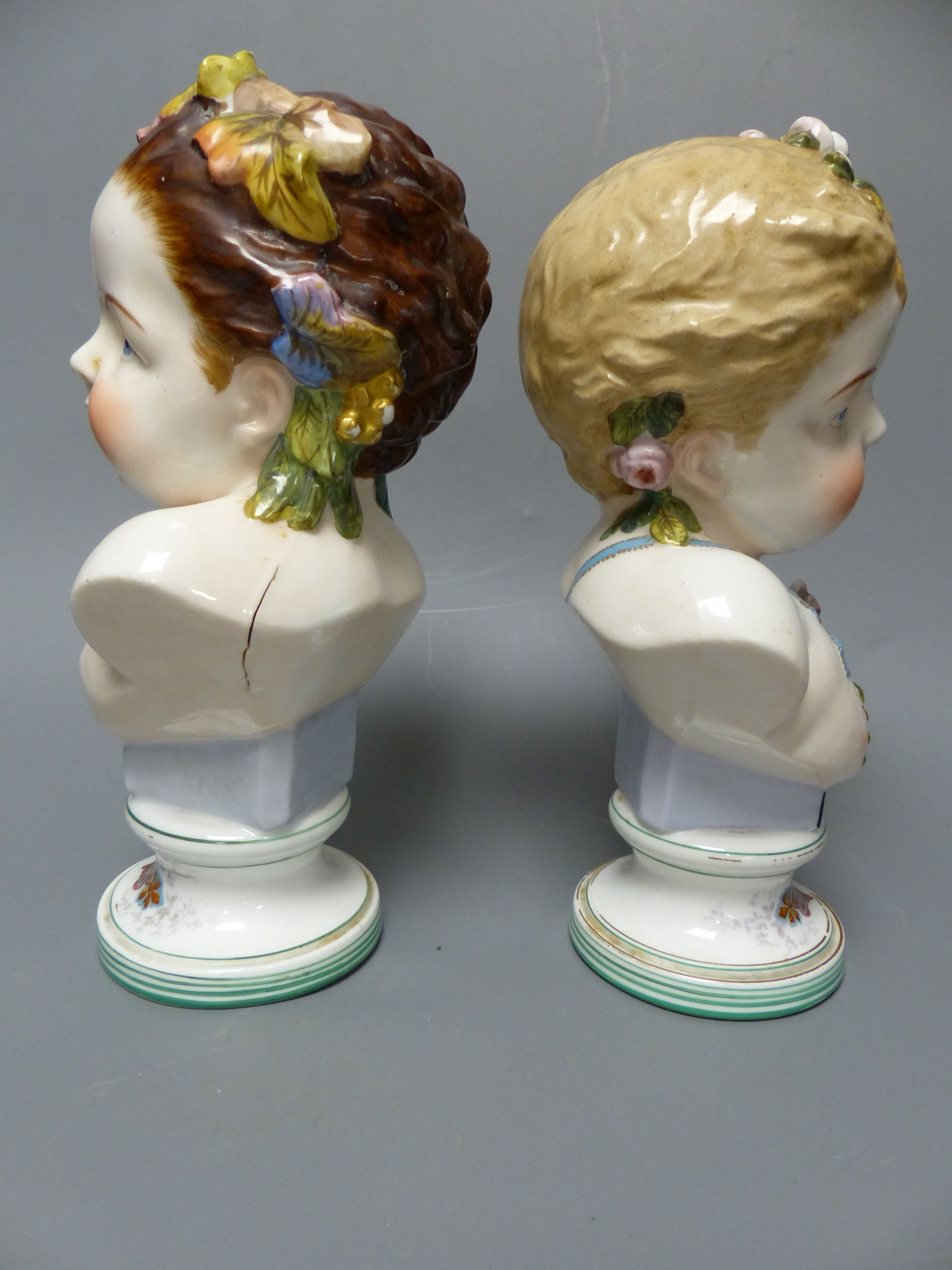 A pair of French porcelain busts Automne and Printemps, a Samson ewer and basin in the Chinese export style and a pair Belleek styl